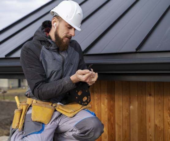 medium shot man working with helmet